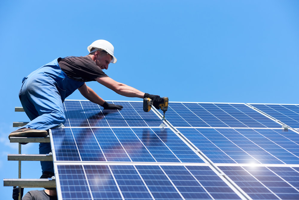 solar panels being installed in Rhodes Ranch